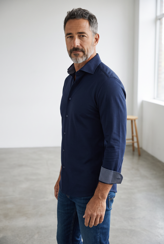 Man wearing a navy blue Emanuel Berg Byron long-sleeve shirt in 4Flex stretch fabric with patterned cuffs