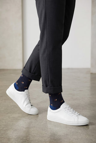 Le Capitaine D'a Bord patterned navy cotton and cashmere socks worn with dark trousers and white sneakers