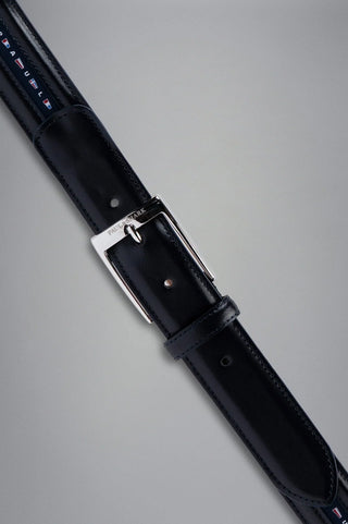 Men's navy blue leather belt with nautical flag details and silver buckle