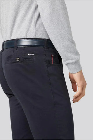 Men's navy cotton Meyer trousers, rear pocket detail, paired with a grey shirt and belt