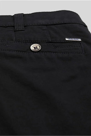 Close-up of black Meyer cotton trousers back pocket with silver button and logo detail