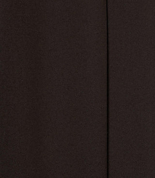 Close-up of light wool brown pant fabric with visible seam, men's fashion detail