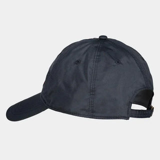 Back view of a navy blue nylon baseball cap with adjustable strap on neutral background
