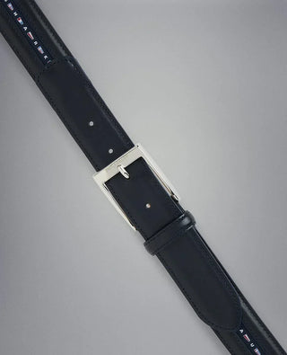 Navy leather belt with silver buckle and colorful nautical flag accents on the strap