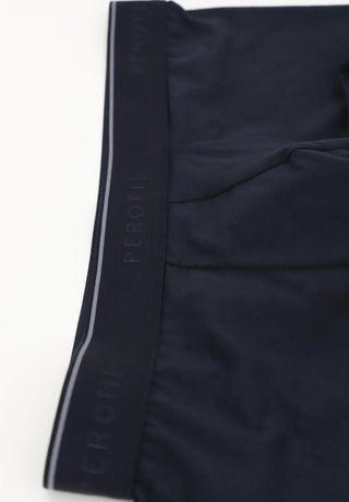 Close-up of navy men's boxer briefs with a wide elastic waistband and tonal logo detail