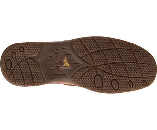 Brown non-marking rubber outsole of a men's boat shoe with textured grip and logo detail